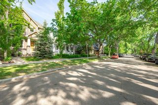 Main Photo: 1 213 11A Street NW in Calgary: Hillhurst Row/Townhouse for sale : MLS®# A2052847