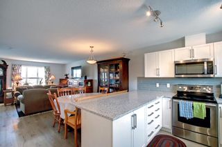 Photo 10: 212 Sunset Road: Cochrane Row/Townhouse for sale : MLS®# A1198532