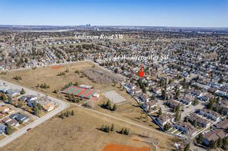 Photo 2: 44 Woodfern Way SW in Calgary: Woodbine Detached for sale : MLS®# A2121128