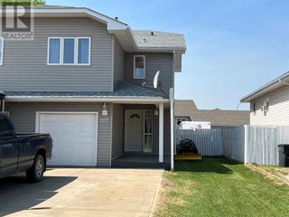 Photo 1: 102 7 st  NE in Slave Lake: House for sale : MLS®# A2050332