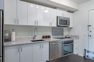 Photo 4: 305 450 8 Avenue SE in Calgary: Downtown East Village Apartment for sale : MLS®# A1187772