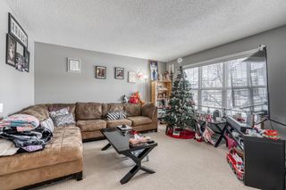 Photo 2: 506 Everridge Drive SW in Calgary: Evergreen Detached for sale : MLS®# A2014101