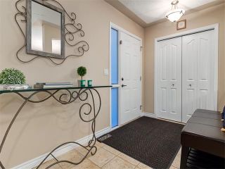 Photo 4: 40 COUGARSTONE Manor SW in Calgary: Cougar Ridge House for sale : MLS®# C4087798