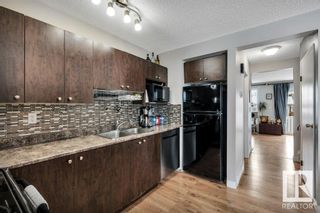 Photo 9: 10480 28A Avenue in Edmonton: Zone 16 Townhouse for sale : MLS®# E4380865