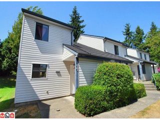 Photo 1: 77 6657 138TH Street in Surrey: East Newton Townhouse for sale in "Hyland Creek Estates" : MLS®# F1019920