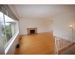 Photo 2: 4538 MANOR Street in Vancouver: Collingwood VE House for sale (Vancouver East)  : MLS®# V768767