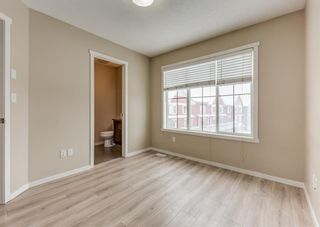 Photo 17: 1406 125 Panatella Way NW in Calgary: Panorama Hills Row/Townhouse for sale : MLS®# A2021769