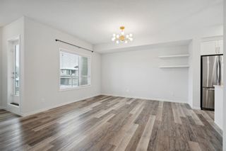 Photo 13: 300 Harvest Hills Way NE in Calgary: Harvest Hills Row/Townhouse for sale : MLS®# A2106977