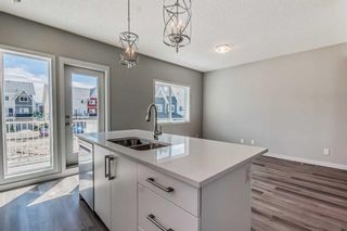 Photo 13: 712 32 red embers parade NE in Calgary: Redstone Row/Townhouse for sale : MLS®# A2060835