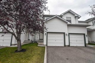 Main Photo: 5 Sandpiper Link NW in Calgary: Sandstone Valley Row/Townhouse for sale : MLS®# A2080825