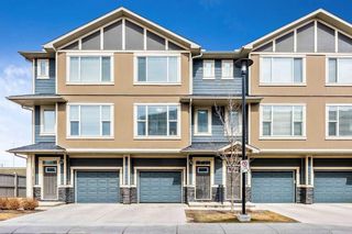 Main Photo: 404 Panatella Walk NW in Calgary: Panorama Hills Row/Townhouse for sale : MLS®# A2137240