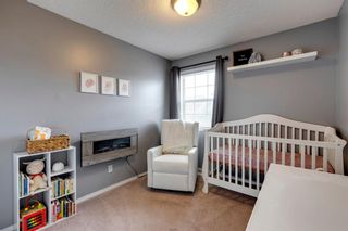 Photo 18: 41 Tuscany Springs Gardens NW in Calgary: Tuscany Row/Townhouse for sale : MLS®# A1232316
