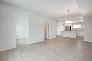 Photo 4: 146 42 Cranbrook Gardens SE in Calgary: Cranston Row/Townhouse for sale : MLS®# A2010110