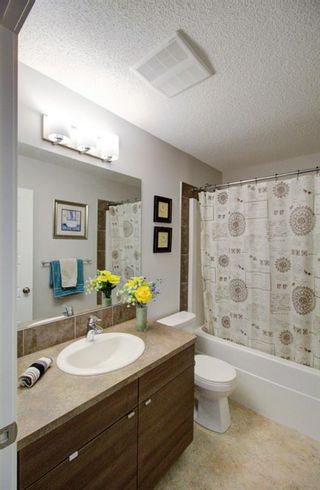 Photo 16: 165 130 New Brighton Way SE in Calgary: New Brighton Row/Townhouse for sale : MLS®# A1065209