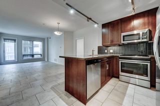 Photo 1: 2103 210 15 Avenue SE in Calgary: Beltline Apartment for sale : MLS®# A2044585