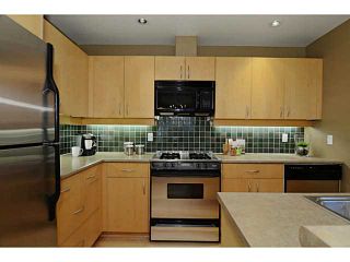 Photo 5: 132 W 16TH Avenue in Vancouver: Cambie Townhouse for sale in "CAMBIE VILLAGE" (Vancouver West)  : MLS®# V1025834