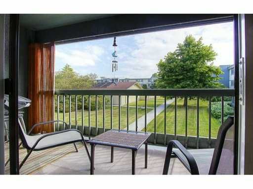 Rare! Open-air balcony with view of peaceful courtyard.