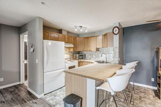 Photo 4: 106 9 Country Village Bay NE in Calgary: Country Hills Village Apartment for sale : MLS®# A1243678