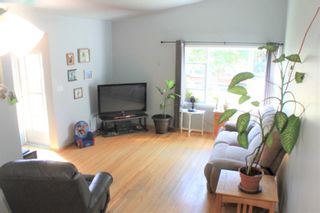 Photo 3: 628 69 Avenue SW in Calgary: Kingsland Semi Detached (Half Duplex) for sale : MLS®# A2012708