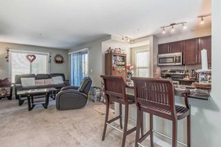 Photo 5: 9202 403 Mackenzie Way SW: Airdrie Apartment for sale : MLS®# A2099073