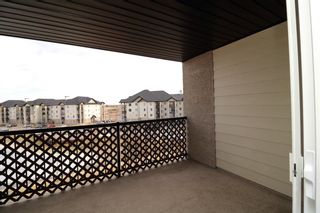 Photo 21: 8414 304 Mackenzie Way SW: Airdrie Apartment for sale : MLS®# A1196177