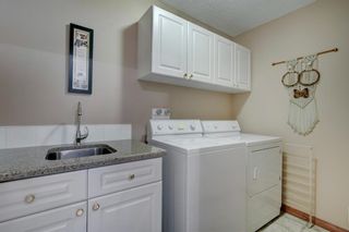 Photo 20: 65 Strathearn Gardens SW in Calgary: Strathcona Park Semi Detached for sale : MLS®# A1240835