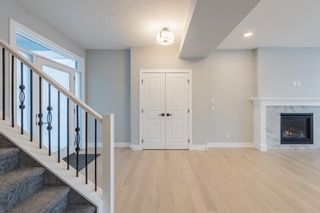 Photo 7: 66 Westmore Park SW in Calgary: West Springs Detached for sale : MLS®# A1065787
