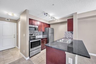 Photo 5: 9212 403 Mackenzie Way SW: Airdrie Apartment for sale : MLS®# A2027286
