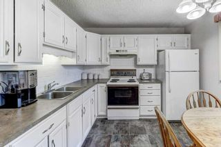 Photo 10: 111 Berwick Way NW in Calgary: Beddington Heights Semi Detached (Half Duplex) for sale : MLS®# A2140022