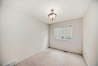 Photo 23: 59 Sandarac Circle NW in Calgary: Sandstone Valley Row/Townhouse for sale : MLS®# A2116581