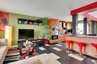 Photo 4: 49 MEADOWVIEW RD SW in Calgary: Meadowlark Park House for sale : MLS®# C4104032