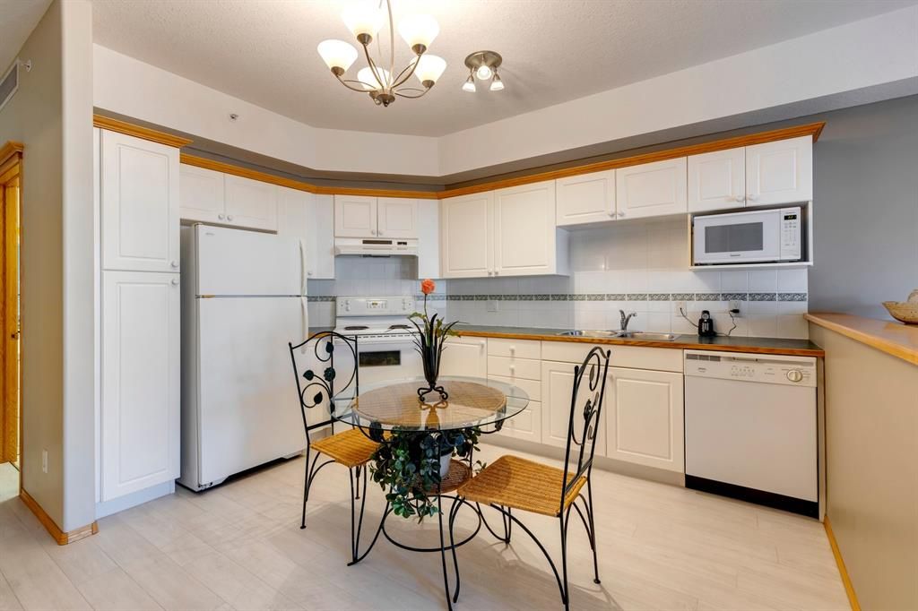 Main Photo: 319 223 Tuscany Springs Boulevard NW in Calgary: Tuscany Apartment for sale : MLS®# A2025251