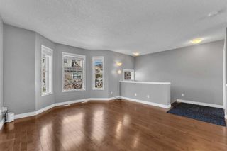 Photo 10: 45 Tuscany Springs Gardens NW in Calgary: Tuscany Row/Townhouse for sale : MLS®# A2081869