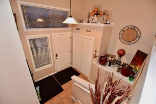 Photo 2: 748 Carriage Lane Drive: Carstairs House for sale : MLS®# C4165695