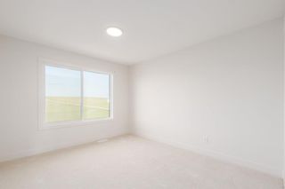 Photo 30: 102 Sundown Close: Cochrane Semi Detached (Half Duplex) for sale : MLS®# A2070990