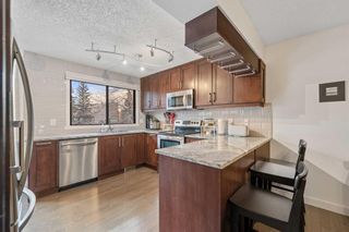 Photo 7: 132 Point Drive NW in Calgary: Point McKay Row/Townhouse for sale : MLS®# A2105102