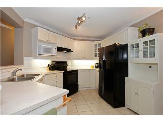 Photo 5: 108 20145 55A Avenue in Langley: Langley City Condo for sale in "BLACKBERRY LANE III" : MLS®# F1431175