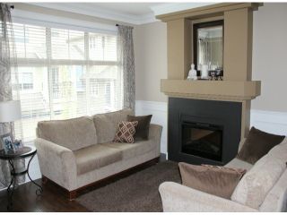 Photo 2: 50 22225 50TH Avenue in Langley: Murrayville Townhouse for sale in "Murray's Landing" : MLS®# F1409670