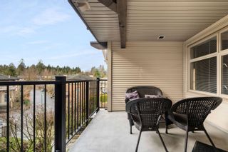 Photo 18: 311 400 KLAHANIE Drive in Port Moody: Port Moody Centre Condo for sale in "TIDES" : MLS®# R2748551