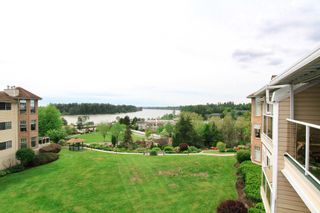 Photo 1: 318 22611 116 Avenue in Maple Ridge: East Central Condo for sale in "ROSEWOOD COURT-FRASERVIEW" : MLS®# R2882360