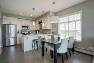 Photo 3: 412 6603 New Brighton Avenue SE in Calgary: New Brighton Apartment for sale : MLS®# A1122252