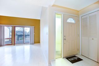 Photo 3: 7050 Edgemont Drive NW in Calgary: Edgemont Row/Townhouse for sale : MLS®# A1108400