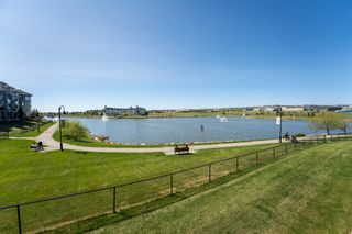 Photo 1: 1212 5 Country Village Park NE in Calgary: Country Hills Village Apartment for sale : MLS®# A2049953