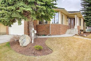 Photo 1: 13843 Evergreen Street SW in Calgary: Evergreen Detached for sale : MLS®# A1099466
