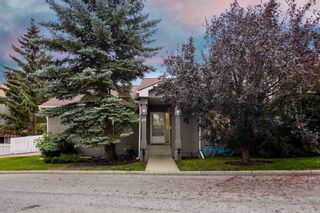 Photo 2: 20 Gladstone Gardens SW in Calgary: Glamorgan Semi Detached (Half Duplex) for sale : MLS®# A2076658