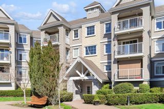 Photo 2: 302 20896 57 Avenue in Langley: Langley City Condo for sale in "Bayberry Lane" : MLS®# R2762942