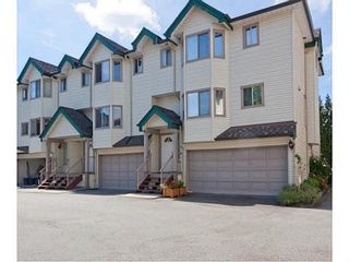 Photo 1: 6 2420 PITT RIVER Road in Port Coquitlam: Mary Hill Townhouse for sale in "PARKSIDE ESTATES" : MLS®# V1143548