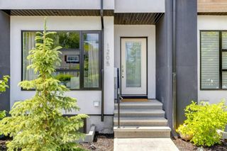 Photo 2: 1205 1 Street NE in Calgary: Crescent Heights Row/Townhouse for sale : MLS®# A1101476