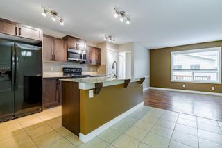 Photo 2: 1072 Kings Heights Road SE: Airdrie Semi Detached (Half Duplex) for sale : MLS®# A1257434