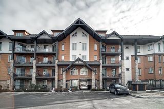 Photo 1: 3201 15 Sunset Square: Cochrane Apartment for sale : MLS®# A1172369